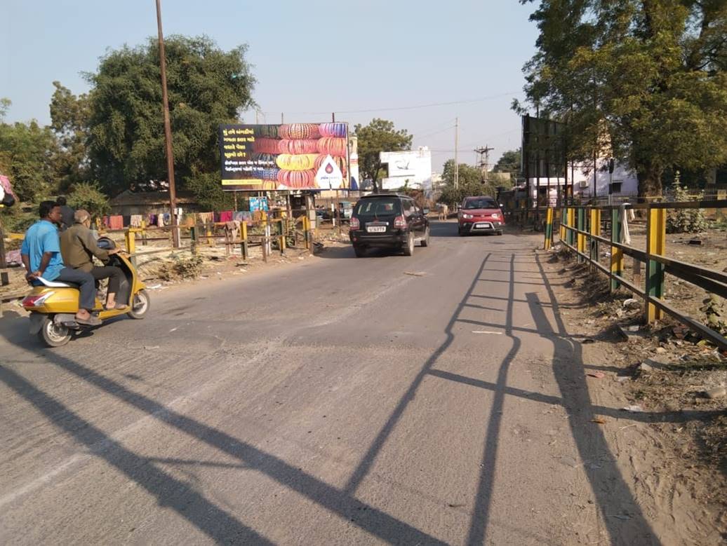 Billboard - Railway Crossing, Kadi (NG), Gujarat Billboard - Railway Crossing, Kadi (NG), Gujarat